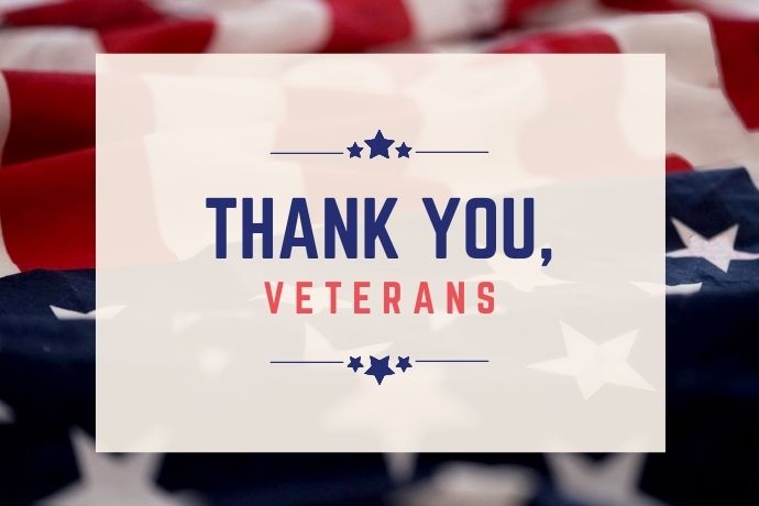 Graphic with the words 'thank you veterans' on a background of the US flag